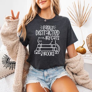 Easily Distracted By Cats And Books Shirt - Funny Cat Shirt, Book Lover Shirt, Cat Lover Shirt, Cat Reading Shirt, Bookworm Shirt