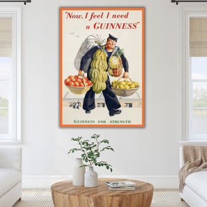 May include: A vintage Guinness advertisement featuring a man carrying a variety of produce, including bananas, pineapples, lemons, and tomatoes. The text reads "Now, I feel I need a GUINNESS" and "GUINNESS FOR STRENGTH".
