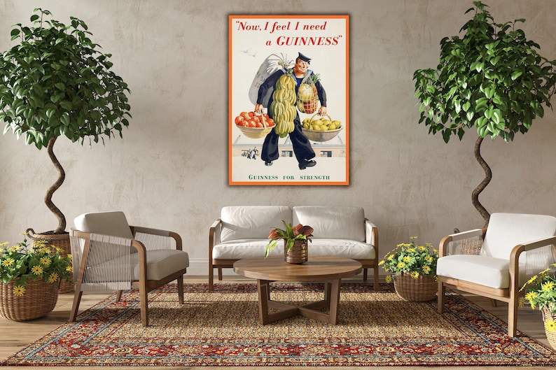 May include: A vintage Guinness advertisement featuring a sailor carrying a basket of fruit and a bag of bananas. The text reads "Now I feel I need a GUINNESS." and "GUINNESS FOR STRENGTH."