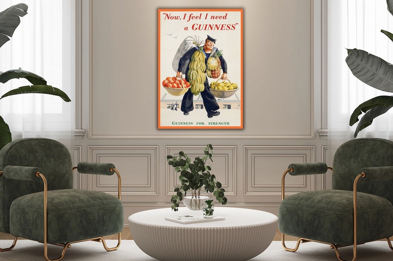 May include: Vintage Guinness advertisement featuring a man carrying a large basket of fruit and the text "Now, I feel I need a GUINNESS". The text "GUINNESS FOR STRENGTH" is at the bottom of the poster.