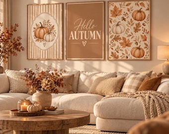 Könnte beinhalten: Drei gerahmte Wandbilder mit Herbstmotiven. Das linke Bild zeigt Kürbisse auf gestreiftem Hintergrund, das mittlere Bild trägt den Text Hello AUTUMN und das rechte Bild zeigt ein Muster aus Kürbissen und herbstlichen Blättern.