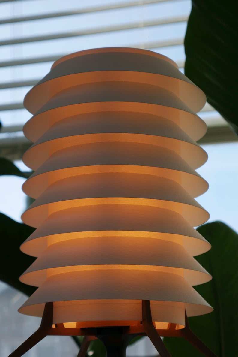 Modern Ambient Cylinder Lamp Sculptural Rings Warm Lighting Photo Inspiration
