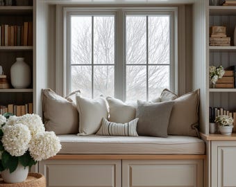 Warm, stylish home office background featuring dark wood shelving, natural light, and curated decor for a cozy, modern look.