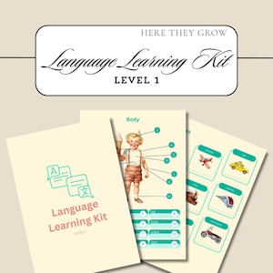 May include: A language learning kit for children, featuring a colorful illustration of a boy and a set of flashcards with images of vehicles and body parts. The kit includes the text "Language Learning Kit" and "Level 1".
