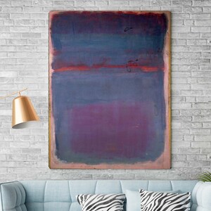 May include: Abstract painting with horizontal bands of color. The top band is a dark purple, the middle band is a light blue, and the bottom band is a pink. The painting is framed and hanging on a white brick wall.