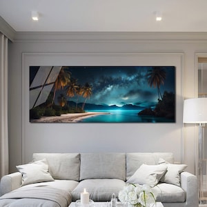 May include: A panoramic photograph of a tropical beach at night with palm trees silhouetted against a dark blue sky with a bright, starry sky. The beach is lit by the moon and the water is a vibrant turquoise blue.