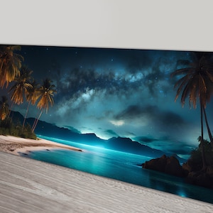 May include: A panoramic view of a tropical beach at night with palm trees silhouetted against a dark blue sky. The Milky Way galaxy is visible in the sky, with a bright blue glow reflecting off the water.