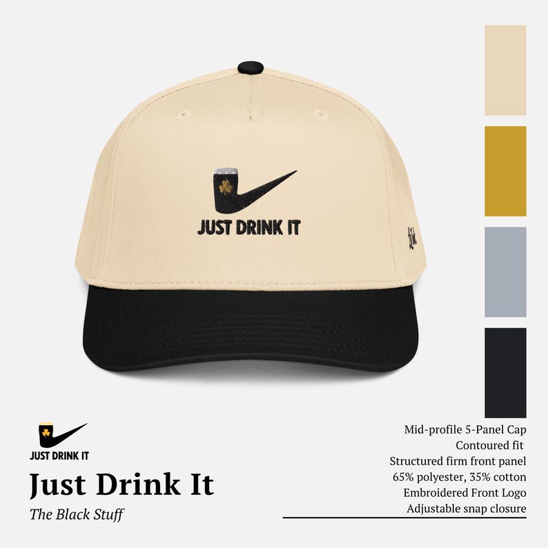 May include: A beige and black baseball cap with the text "JUST DRINK IT" and a graphic of a beer mug and a checkmark. The cap has a curved brim and an adjustable snap closure.