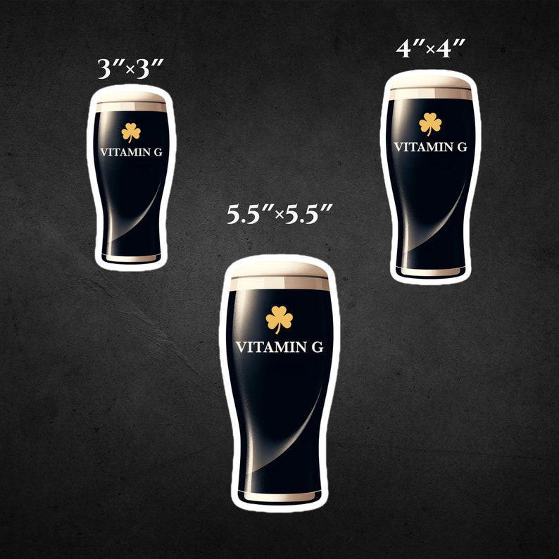 May include: Three sticker sizes are shown: 3"x3", 4"x4", and 5.5"x5.5". Each sticker depicts a dark stout beer with a white foamy head, a gold shamrock, and the text "VITAMIN G". The stickers have a white border.