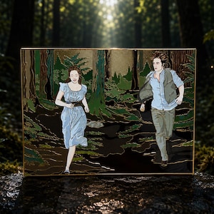 May include: A rectangular enamel pin featuring a colorful illustration of two figures running through a dark forest. One figure wears a light blue dress, and the other wears a light blue shirt with a dark vest and tan pants, set against a background of green trees.