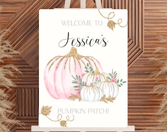 May include: Welcome to Jessica's Pumpkin Patch! Sign with a pink and gold glitter pumpkin and white pumpkins with gold glitter accents.