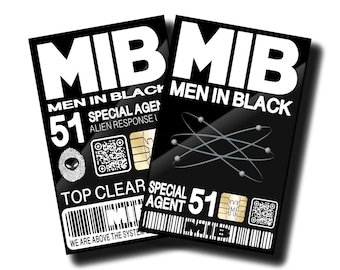 May include: Two black and white Men in Black ID cards with the text "Men in Black" and "Special Agent 51". The cards have a black and white alien symbol, a barcode, and a QR code.