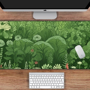 May include: A green and white illustrated mousepad with a leafy pattern. The mousepad is 31 inches by 15.5 inches.
