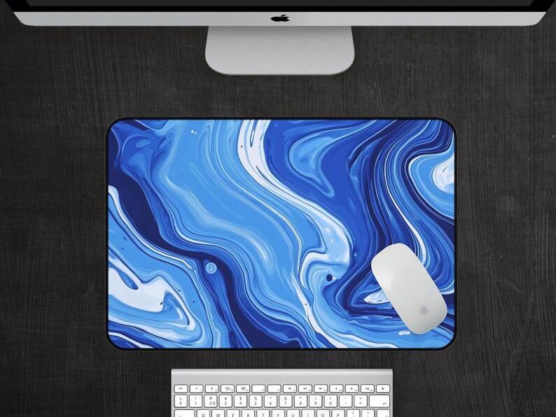 May include: Blue and white abstract marble design mouse pad. The design features swirling blue and white lines.