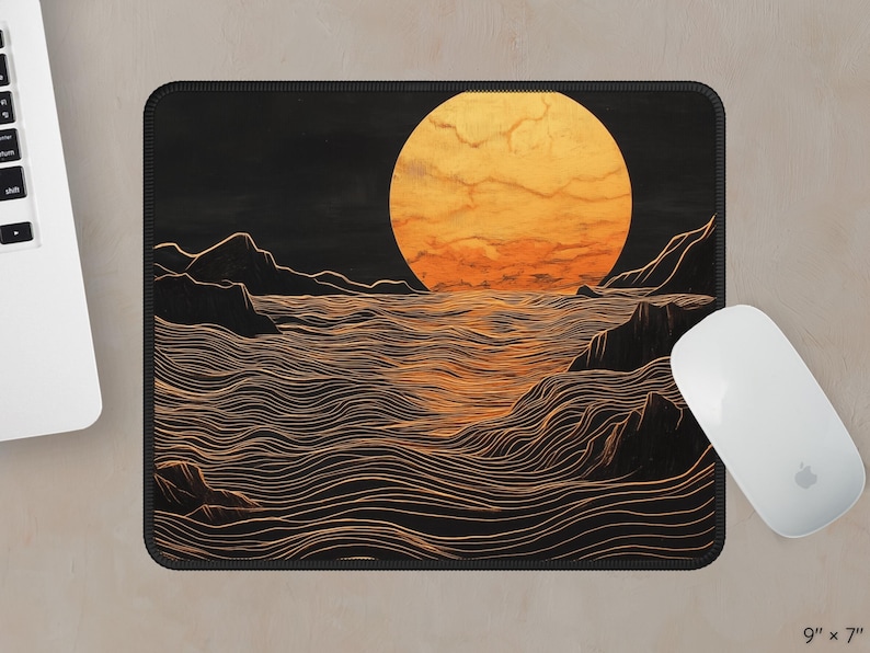 May include: A black and gold mouse pad with a stylized illustration of a large orange sun setting over a wavy ocean. The ocean is depicted with thin, white lines.