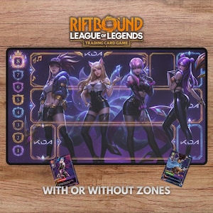 May include: A rectangular playmat for the "Riftbound League of Legends Trading Card Game" featuring four stylized female characters in black and purple outfits. The mat includes zones and the text "WITH OR WITHOUT ZONES".