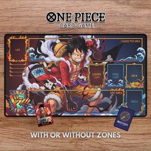 May include: A rectangular One Piece Card Game playmat featuring a central illustration of Monkey D. Luffy in a red shirt and straw hat. The mat includes designated zones for Life, Character Area, Leader Card, Stage Card, Deck, and Trash.