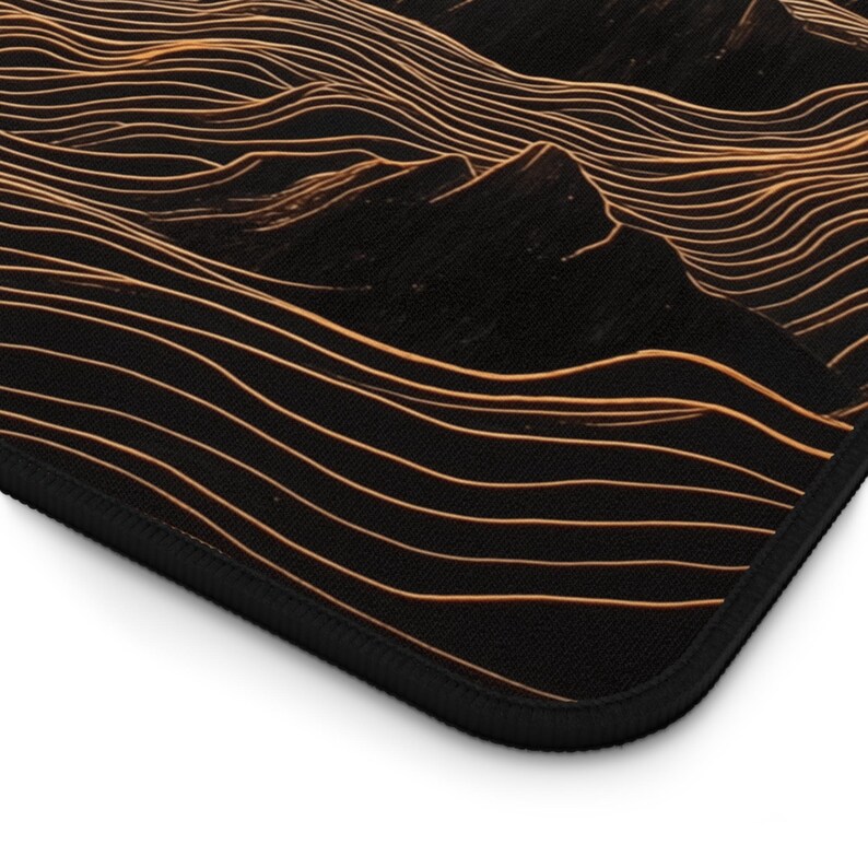 May include: Abstract art print featuring a black background with a pattern of orange wavy lines. The lines create a sense of depth and movement, resembling a landscape or a series of waves.