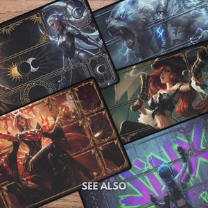 May include: A collection of rectangular gaming mats featuring fantasy art. The mats showcase various characters and scenes, including a woman with guns, a wolf, and other figures. The mats have decorative borders and the text "SEE ALSO".