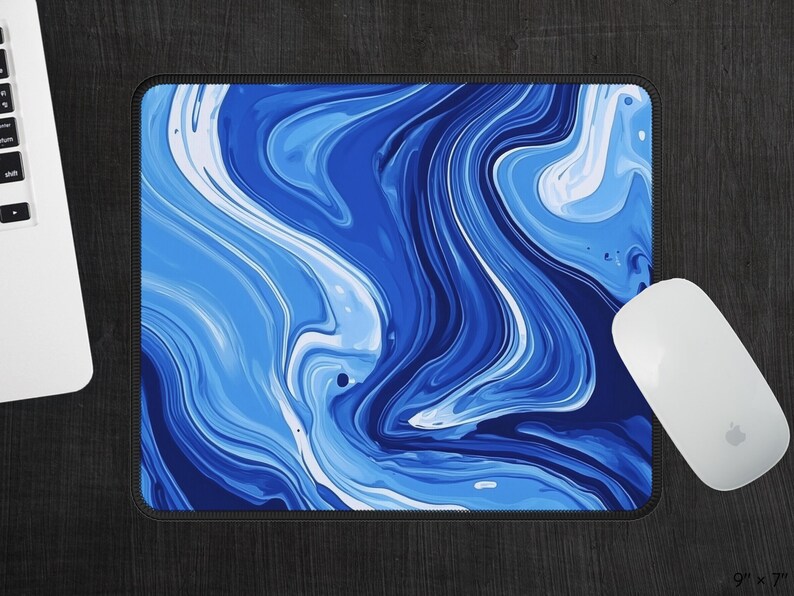 May include: Blue and white abstract marble design mouse pad. The mouse pad is 9 inches by 7 inches.