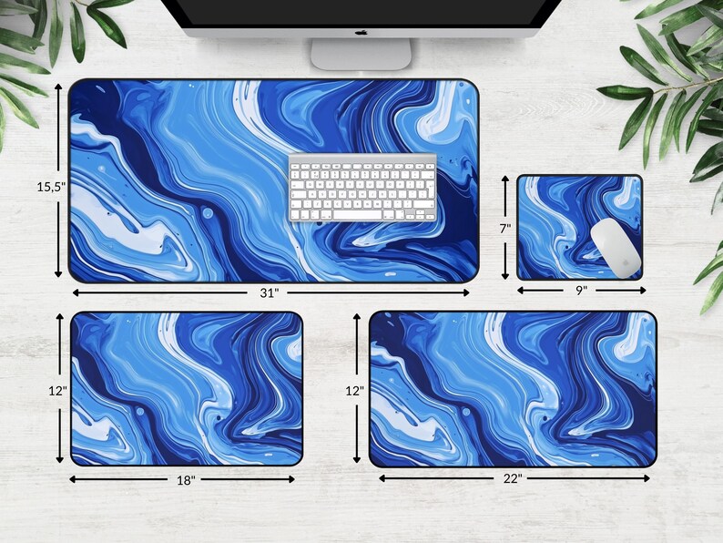 May include: A set of four blue and white marble-patterned mouse pads in various sizes. The largest mouse pad is 31 inches by 15.5 inches, the second largest is 22 inches by 12 inches, the third largest is 18 inches by 12 inches, and the smallest is 9 inches by 7 inches.