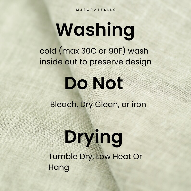 May include: A close-up of a beige fabric with black text outlining washing and drying instructions. The text reads: "Washing cold (max 30C or 90F) wash inside out to preserve design Do Not Bleach, Dry Clean, or iron Drying Tumble Dry, Low Heat Or Hang"
