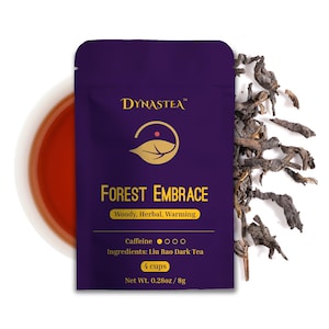 May include: Purple pouch with the text "DYNASTEA" and "FOREST EMBRACE" in gold lettering. The pouch contains loose leaf tea and has the text "Woody, Herbal, Warming", "Caffeine", "Ingredients: Liu Bao Dark Tea", "4 cups", and "Net Wt. 0.28oz/8g" printed on it.