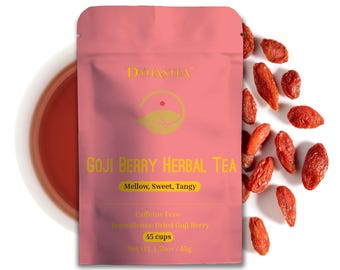 May include: Pink pouch with a yellow label that reads "DYNASTEA GOJI BERRY HERBAL TEA Mellow, Sweet, Tangy Caffeine Free Ingredients: Dried Goji Berry 45 cups Net Wt 1.53oz / 43g".  Dried goji berries are scattered around the pouch.