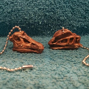Handmade Dinosaur Fossil Skull Light/Fan Pulls – Set of 2