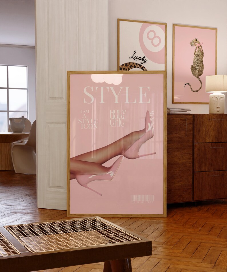 May include: A pink and white magazine cover with the word "STYLE" in large white letters. The cover features a woman's legs in pink high heels. The text on the cover reads "I am a style icon, Holy Holy Chic".