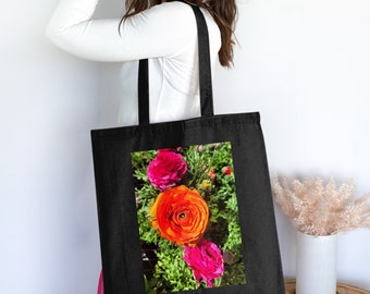 Bolsa de compras ecológica de algodón con diseño floral de ranúnculos naranjas.
