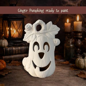 May include: A white ceramic pumpkin-shaped decoration with a carved face, leaf and rose details, and a hole at the top. The text "Ginger Pumpking ready to paint" is above the pumpkin. Perfect for Halloween or fall decor.