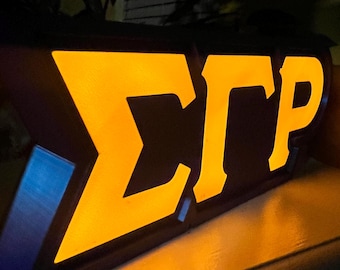 Lavagna luminosa a LED ispirata alle lettere greche Sigma Gamma Rho.