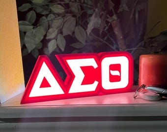 Caja de luz con letras griegas inspirada en Delta Sigma Theta con LED.