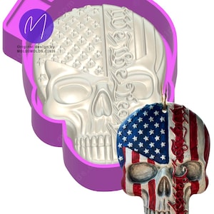 May include: A skull-shaped ornament with an American flag design. The skull is painted with red and white stripes and blue stars. A purple mold with the text "Original design by MOLD2MOLDS ©2026" surrounds a skull-shaped impression with the American flag design.