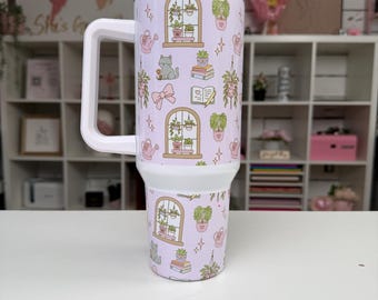 Vaso térmico Cottagecore con diseño de plantas de interior, gatos y libros: acero inoxidable de 1,1 litros (40 oz) con un acogedor diseño de libro.