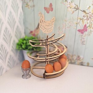 Spiral egg dispenser
