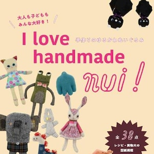 May include: A book cover with the title "I love handmade nui!" in pink and white text. The cover features illustrations of various handmade plush toys, including a cat, frog, bunny, and elephant. The book includes 38 patterns for making these toys.