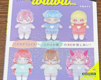 May include: A magazine cover featuring illustrations of six plush dolls with different hair colors and outfits. The magazine cover is titled "wawawa-chan" and has the text "te-zukuri koshinu" and "hirakuru azusa" in Japanese. The magazine cover also includes the text "こだわりフェイス + ふわふわ髪 のNEW推しぬい!" in Japanese, which translates to "こだわりのフェイス + ふわふわ髪 のNEW推しぬい!" in English. The magazine cover also includes the text "商用利用OK!" in Japanese, which translates to "Commercial use OK!" in English. The magazine cover also includes the text "28号" in Japanese, which translates to "Issue 28" in English.