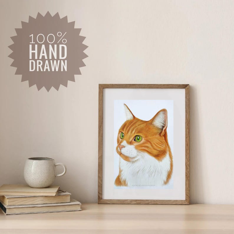 May include: A framed portrait of an orange and white tabby cat with green eyes. The cat is depicted in a realistic style with detailed fur texture. The artwork is presented in a simple wooden frame, capturing the feline's head and chest.