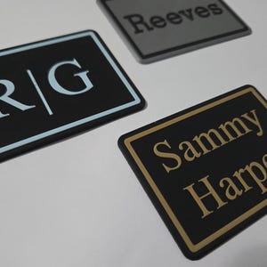 Yeti custom patches in blue, grey, and light brown