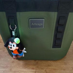 Dark Green Yeti Camino cooler with name tag