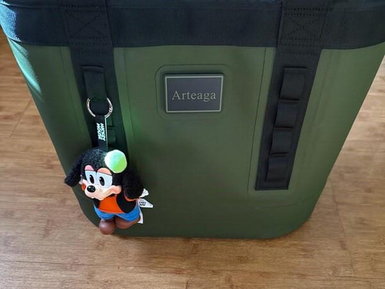 Dark Green Yeti Camino cooler with name tag