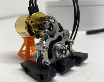 UPPERcut Centered motor and output shaft performance transmission. 9mm out runners for SCX24, competition crawler
