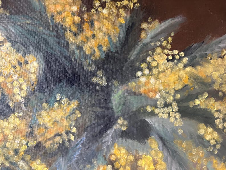 May include: A close-up of a painting of a bouquet of yellow mimosa flowers with dark green leaves against a dark brown background.