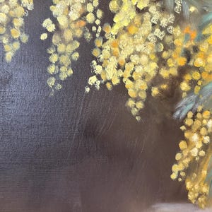 May include: A close-up of a painting featuring a branch of yellow mimosa flowers against a dark brown background.