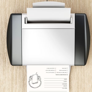 May include: A white sheet of paper with a black and white drawing of headphones and a book is being printed from a black and silver printer. The paper has a title that says "Audiobook Review" and a list of questions to answer about the audiobook.