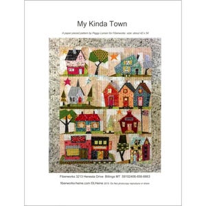 May include: A paper pieced quilt pattern titled "My Kinda Town" by Peggy Larsen for Fiberworks. The quilt design features colorful, whimsical houses, trees, and stars. The pattern size is about 42 x 54 inches.