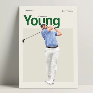 May include: A golfer wearing a blue and white patterned shirt, white pants, and a black belt swings a golf club. The text "Cameron Young" is printed in green letters above the golfer.