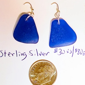 Earrings: Cobalt blue sea glass on sterling silver plated rings
